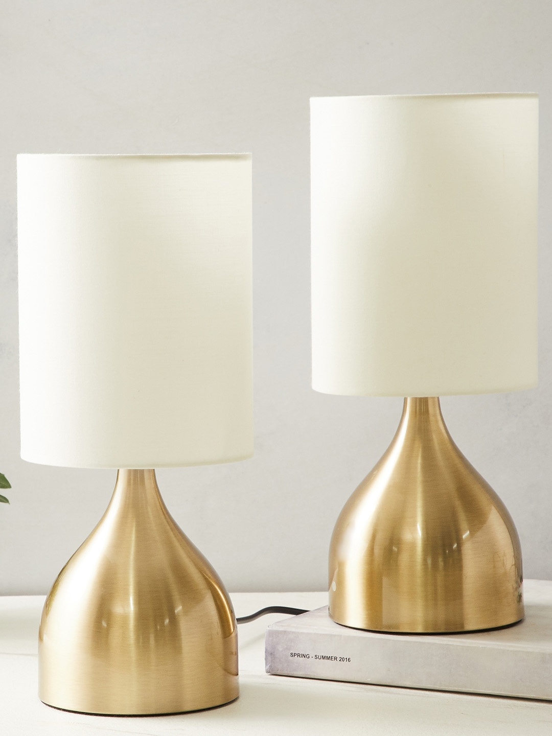 

Home Centre Albama Vogue 2 Pcs Gold-Toned & White Modern Touch Lamps