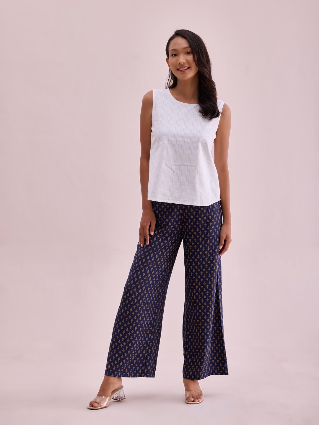 

Go Colors Women Navy Blue & Gold-Toned Ethnic Motifs Printed Flared Palazzos