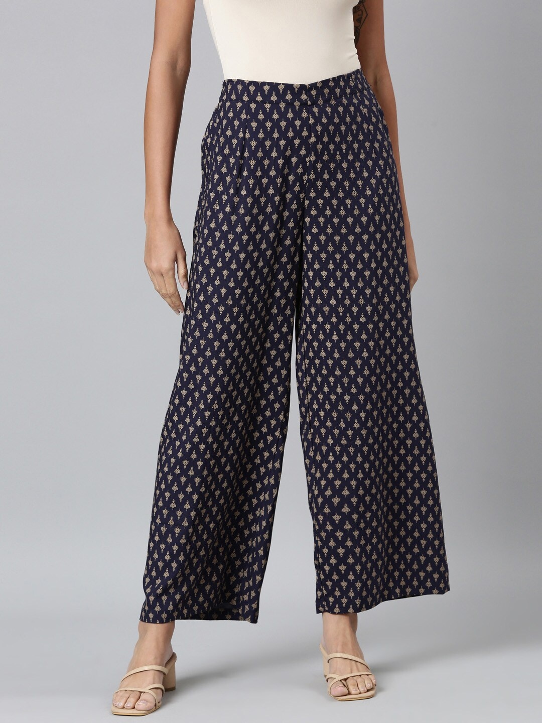 

Go Colors Women Navy Blue & Gold-Toned Ethnic Motifs Printed Palazzos