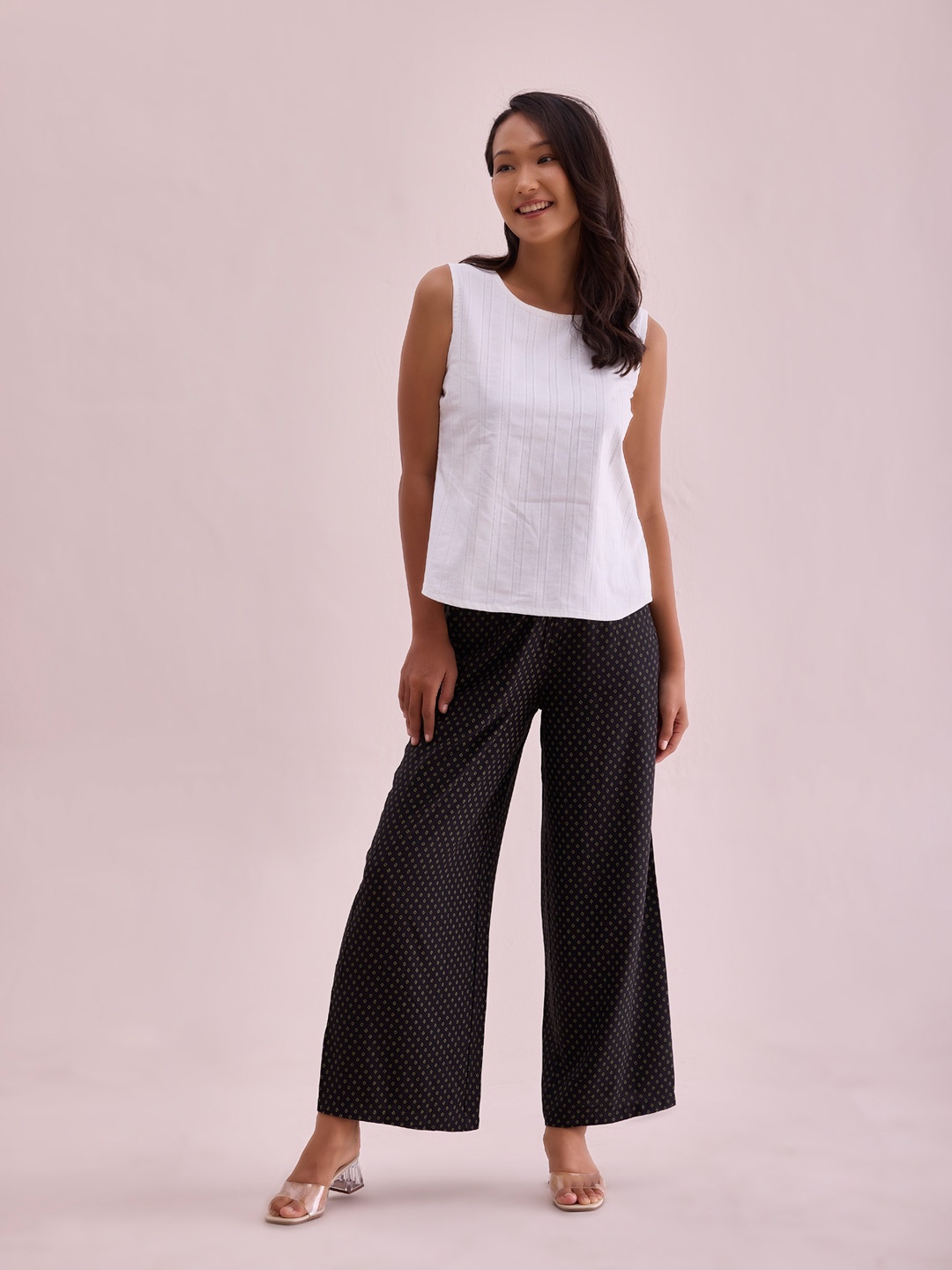 

Go Colors Women Black & Gold-Toned Printed Palazzos