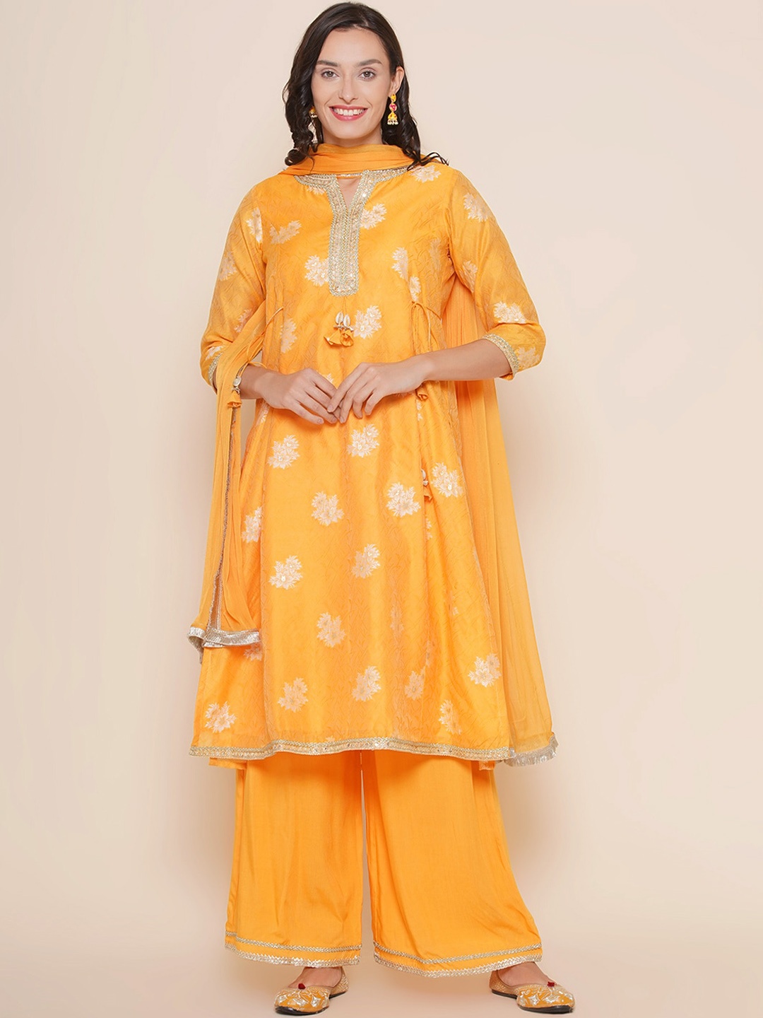 

Bhama Couture Floral Printed Round Neck Thread Work Regular Kurta with Palazzos & Dupatta, Mustard