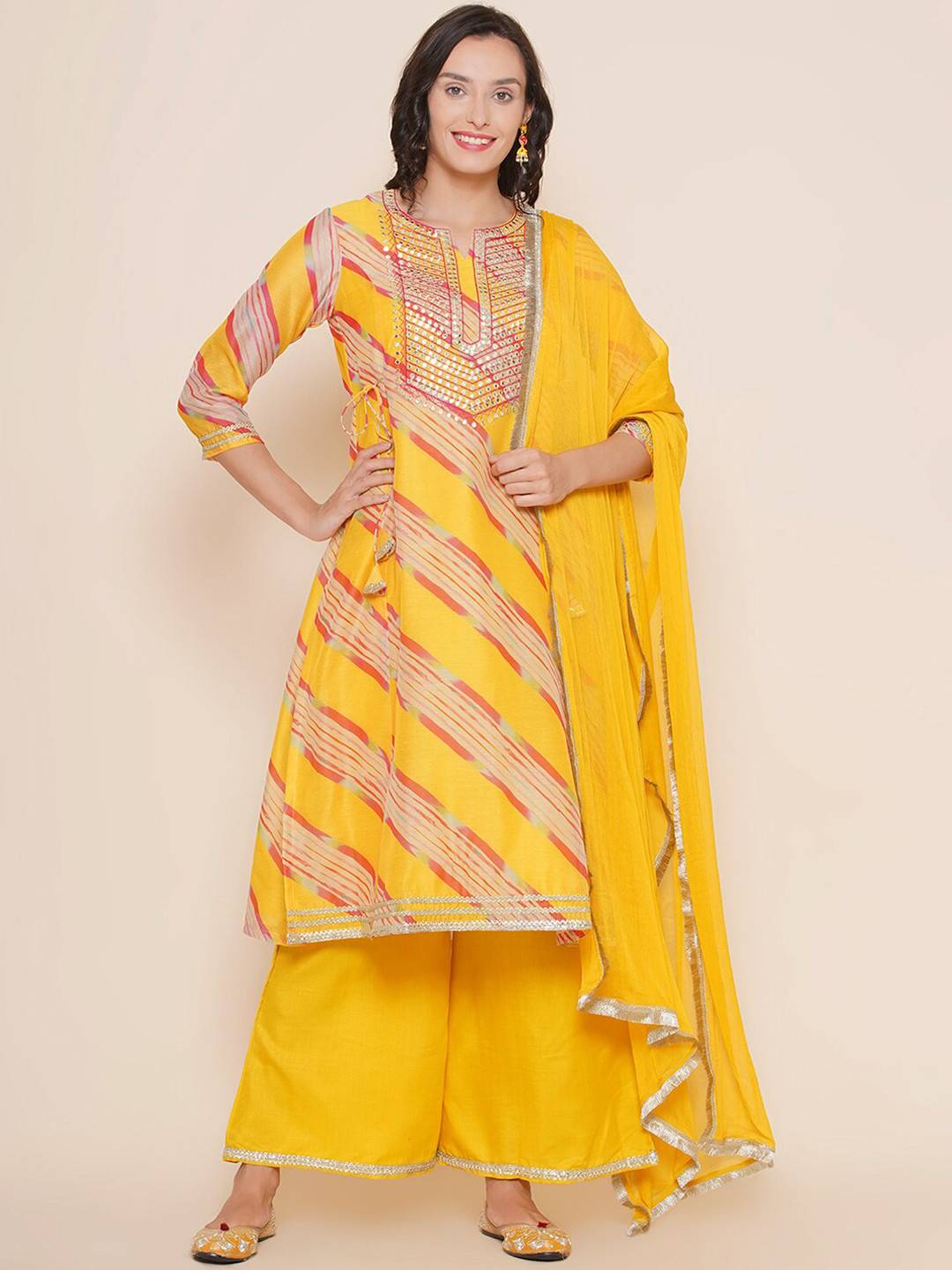 

Bhama Couture Leheriya Ethnic Printed Thread Work A-Line Kurta with Palazzos & Dupatta, Yellow