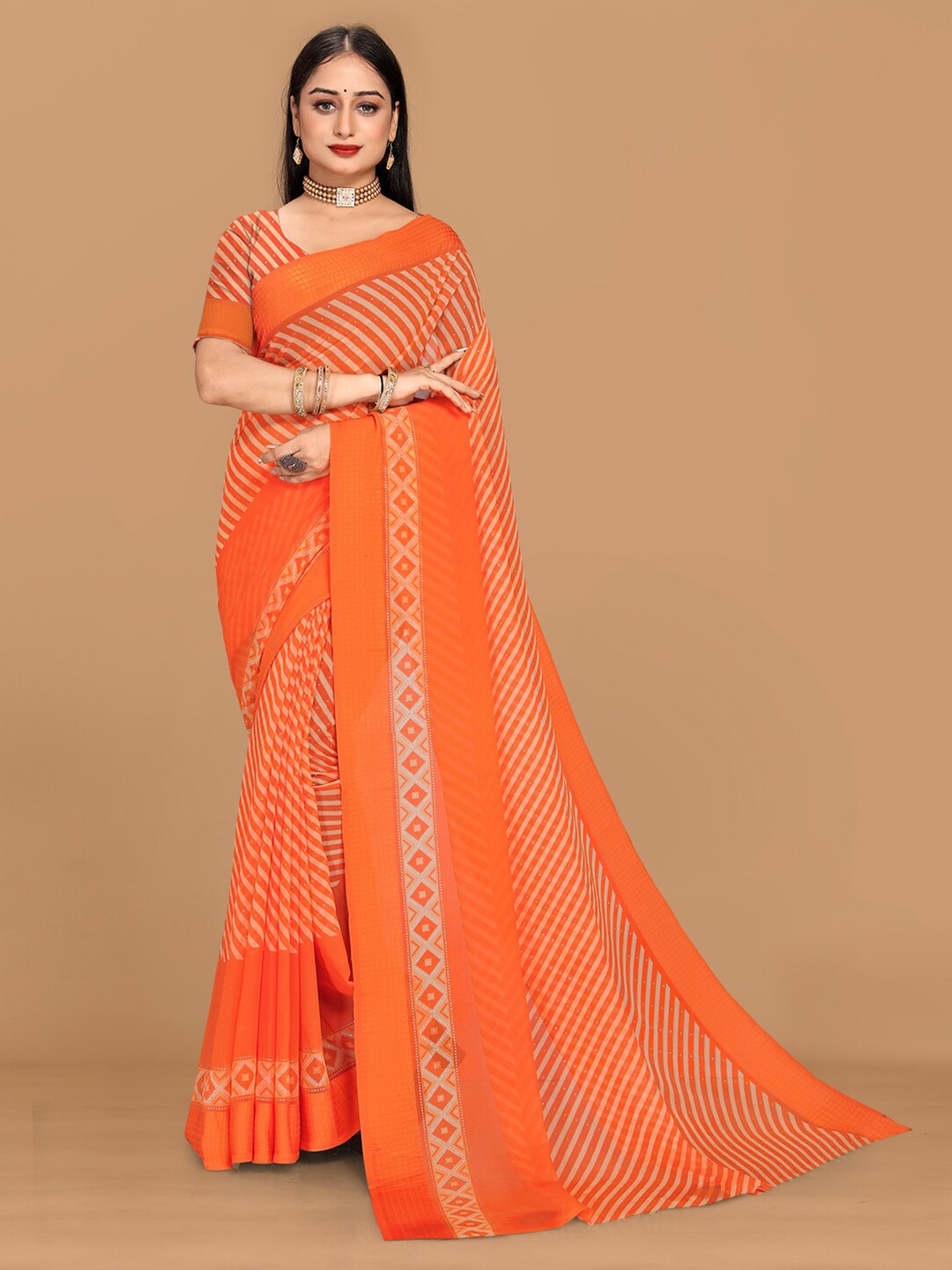 

KALINI Striped Pure Georgette Saree, Orange