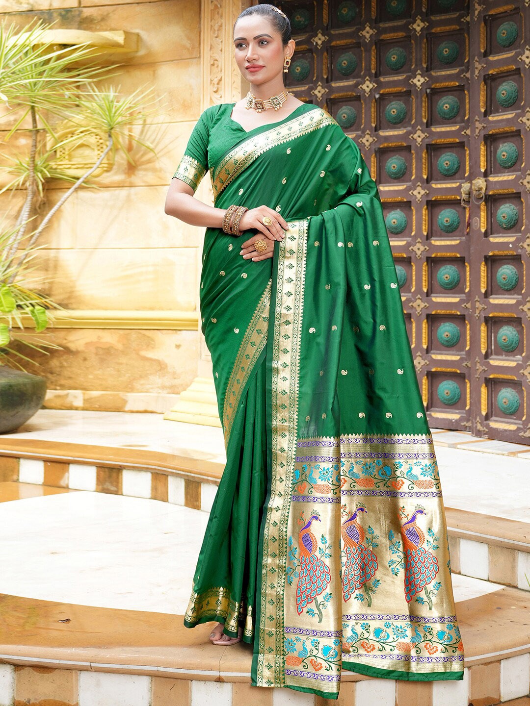 

Satrani Green Paisley Woven Design Zari Detailed Paithani Saree