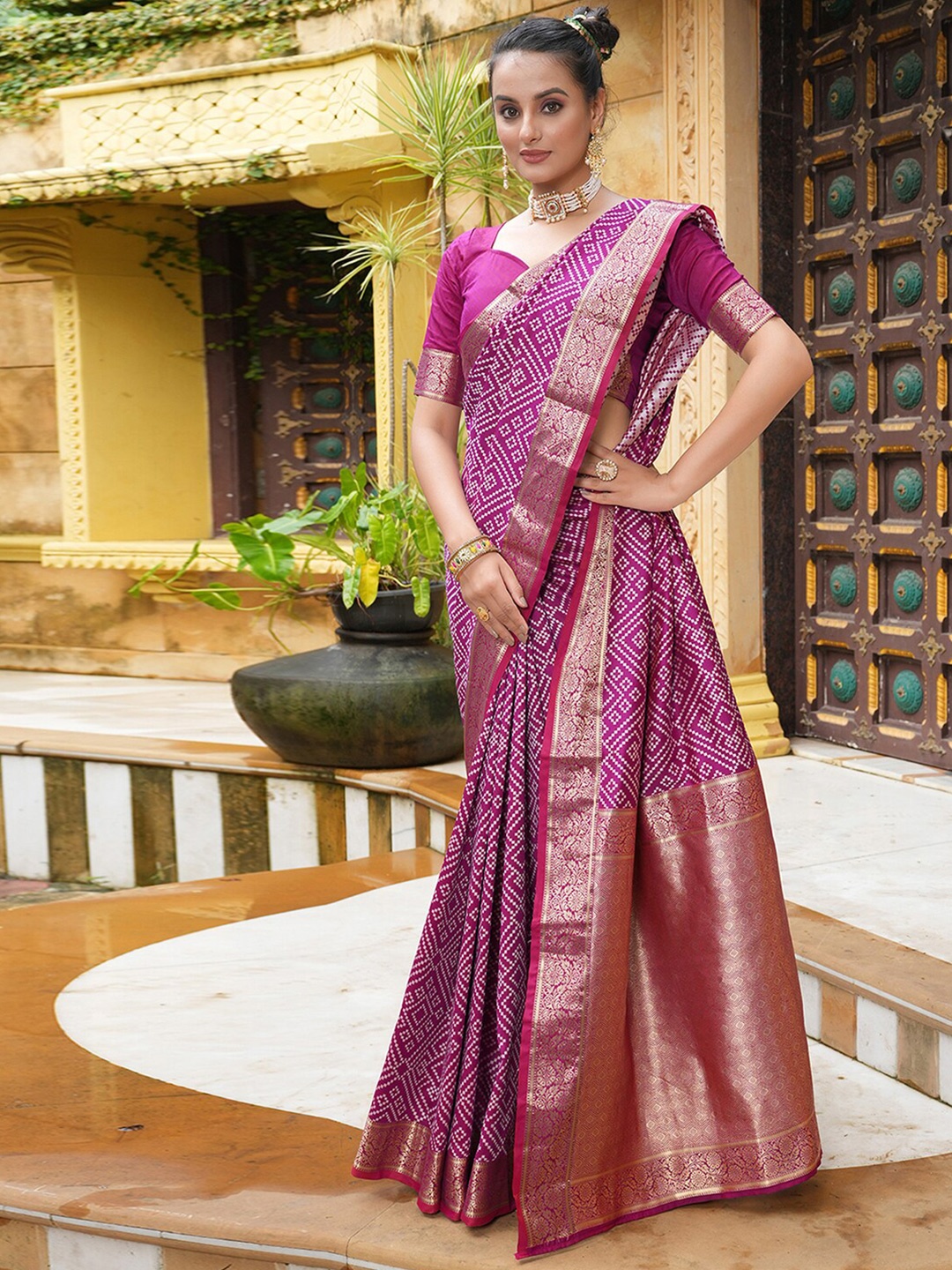 

Satrani Purple Ethnic Motifs Printed Zari Detailed Saree