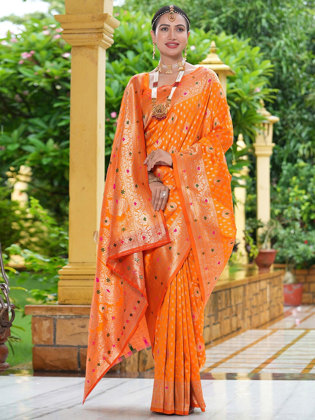 

Satrani Orange Ethnic Motifs Woven Design Zari Detailed Banarasi Saree
