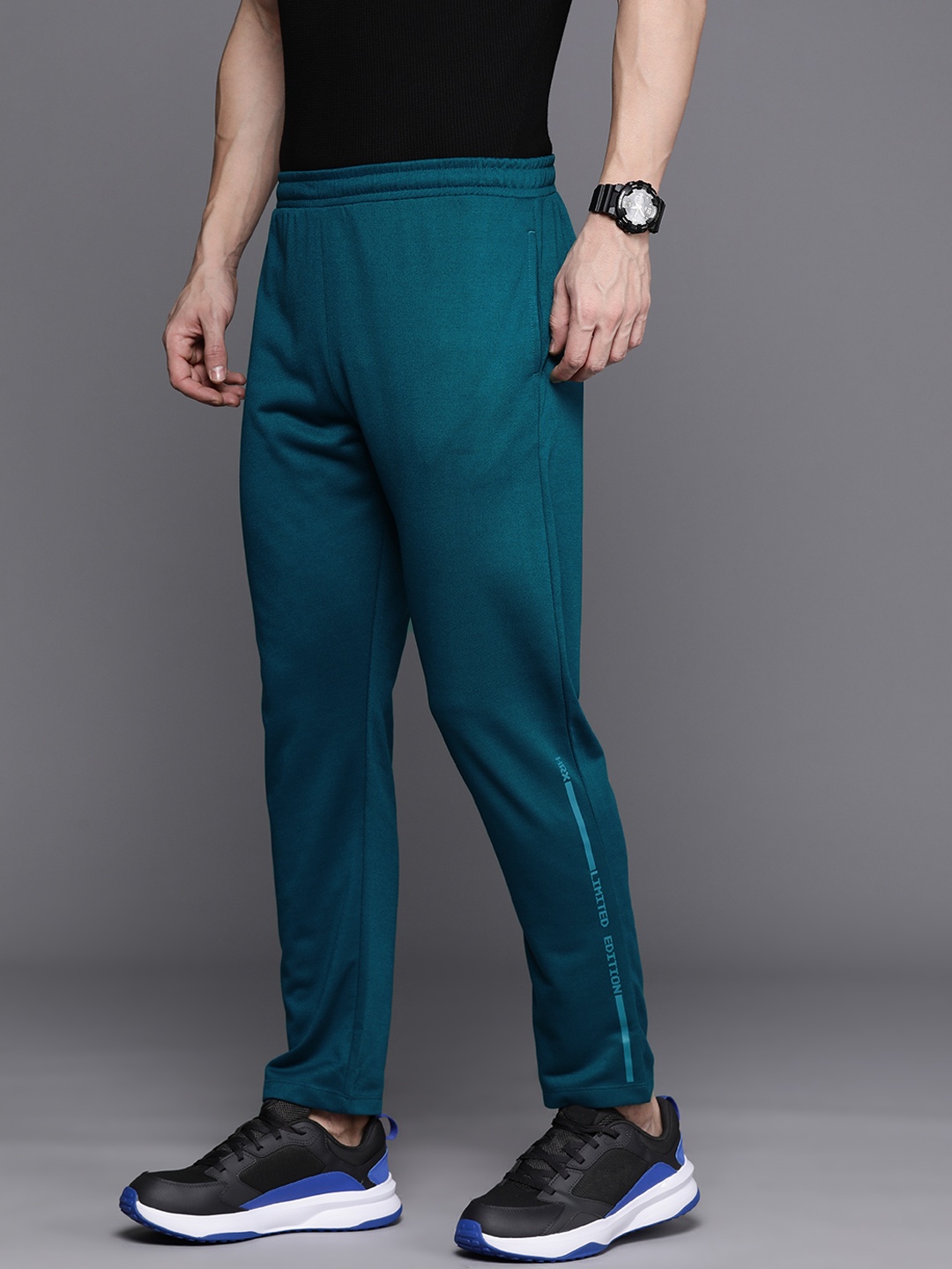 

HRX by Hrithik Roshan Men Regular Fit Track Pants, Teal