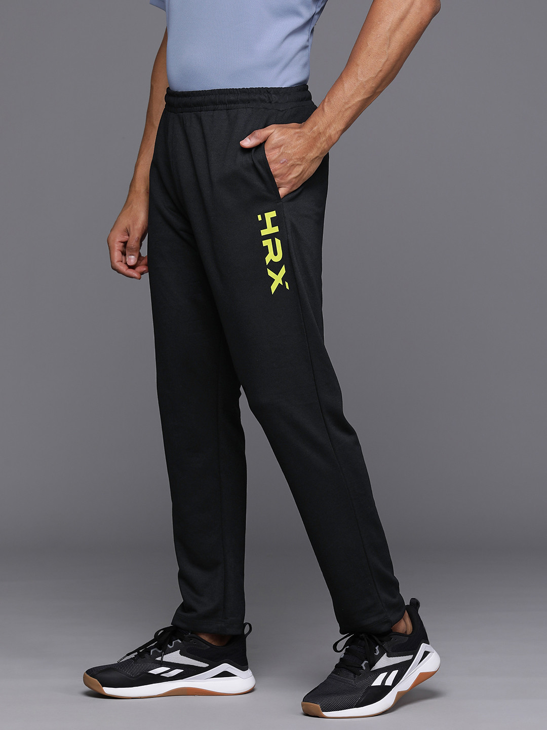 

HRX by Hrithik Roshan Men Mid-Rise Brand Logo Print Detail Track Pants, Black