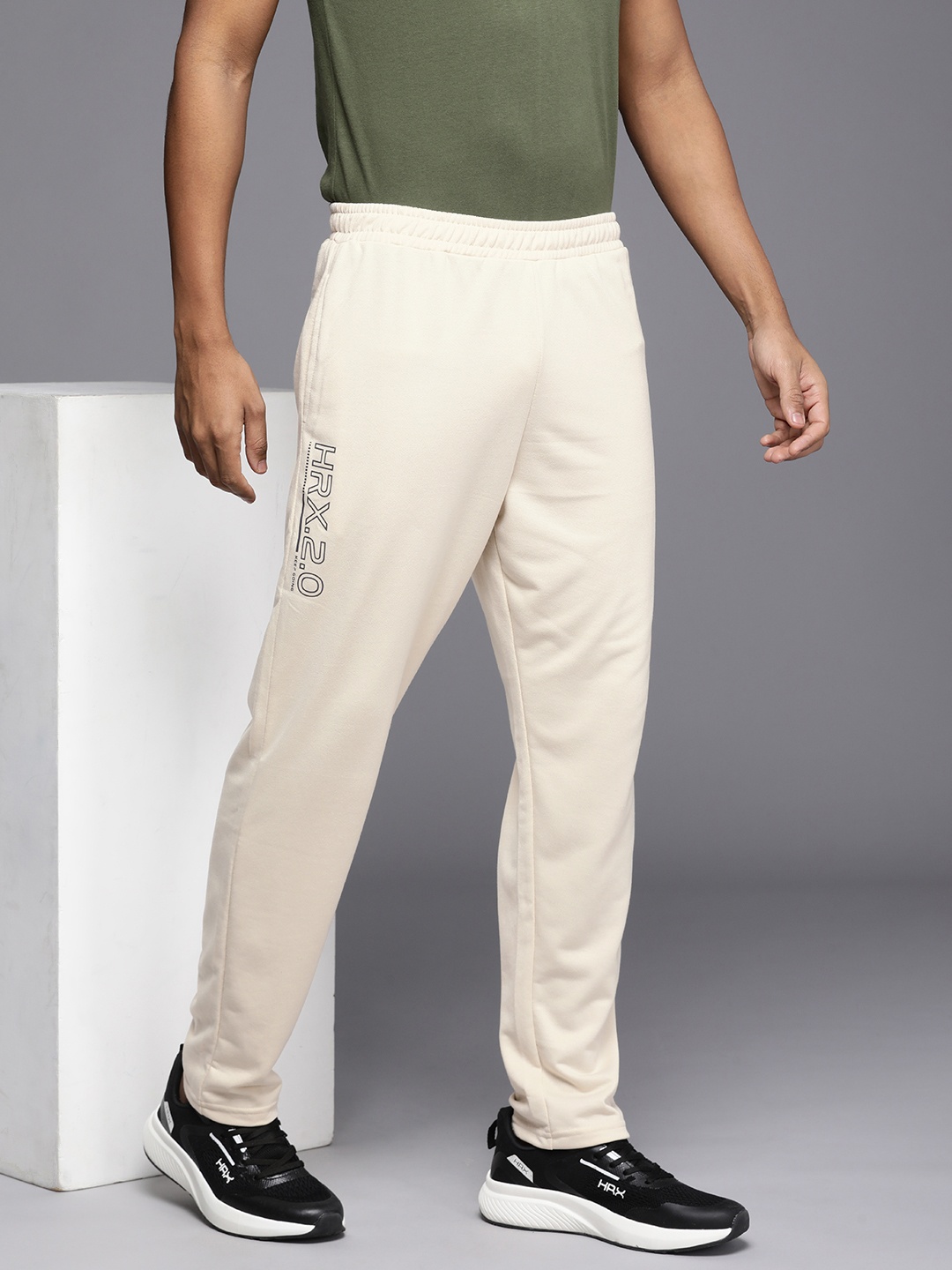 

HRX by Hrithik Roshan Men Brand Logo Printed Track Pants, Beige