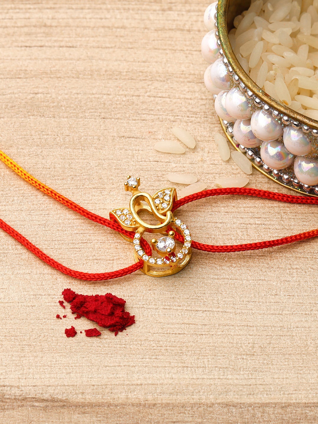 

GIVA 925 Sterling Silver 18k Gold-Plated Ganesha Charm Rakhi With Roli Chawal