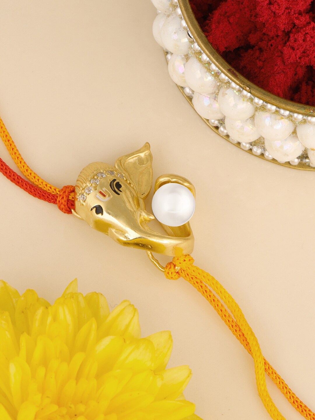

GIVA 18K Gold Plated Ganesha Face Charm Rakhi