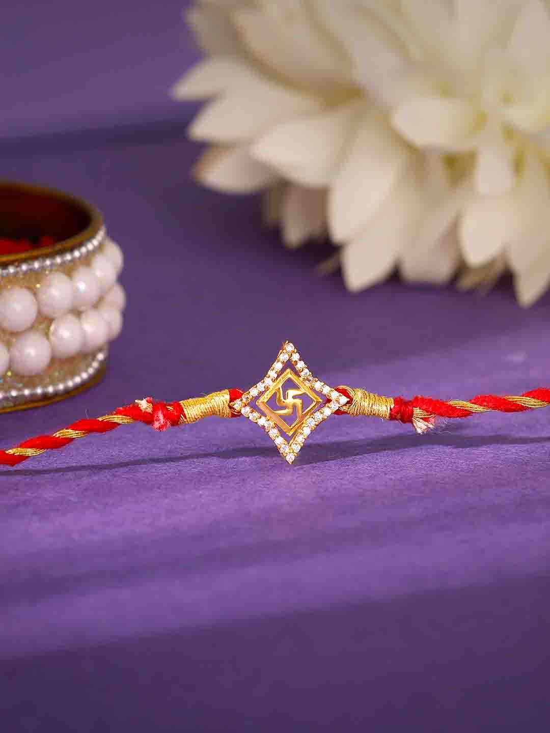 

GIVA 18KT Gold Plated Swastik Charm Rakhi