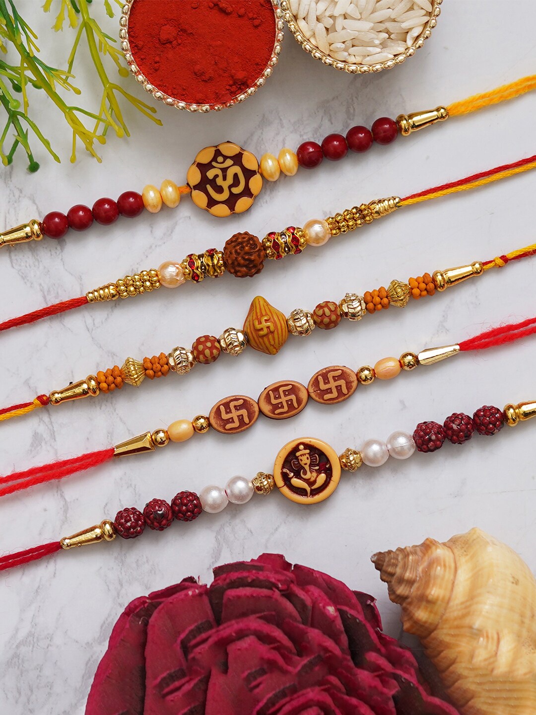 

eCraftIndia Unisex Set Of 5 Om-Rudraksh-Swastik-Ganesh Charm Rakhi With Roli Chawal, Red