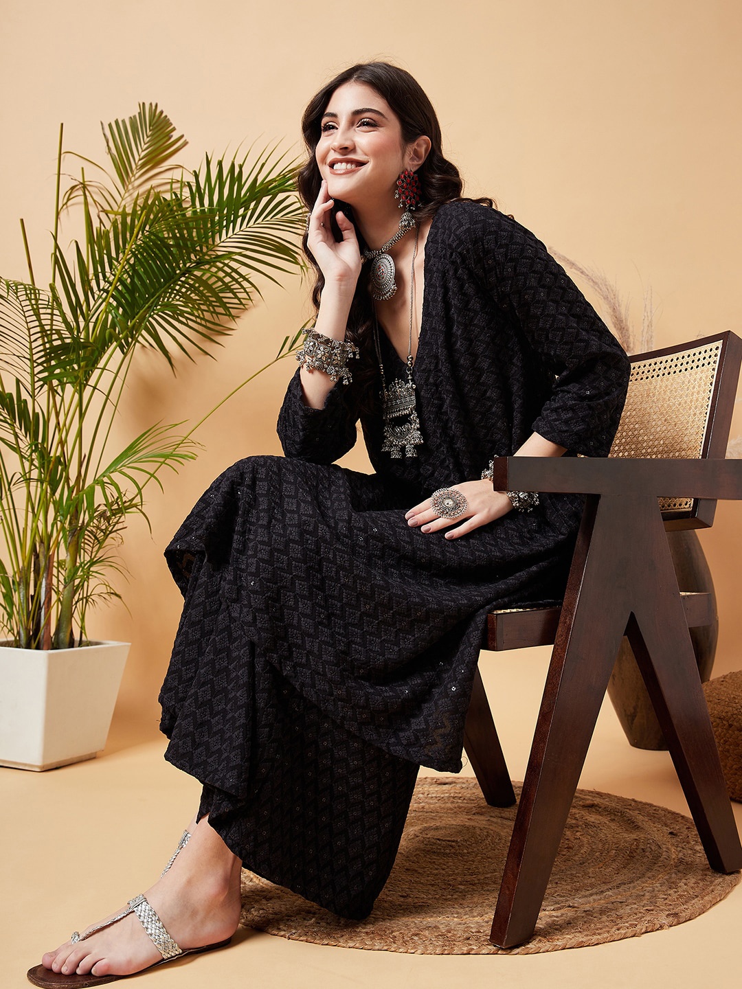 

Sangria Geometric Embroidered Chikankari Sequinned A-Line Kurta With Palazzo Set, Black