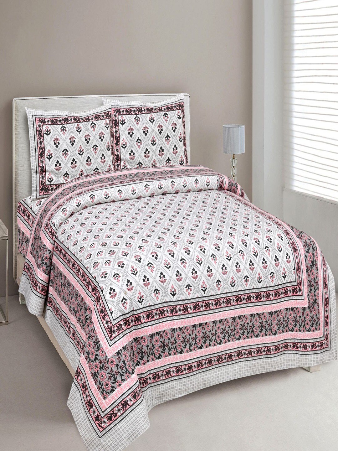 

UNIQCHOICE Pink & White Printed Cotton 180 TC King Bedsheet with 2 Pillow Covers