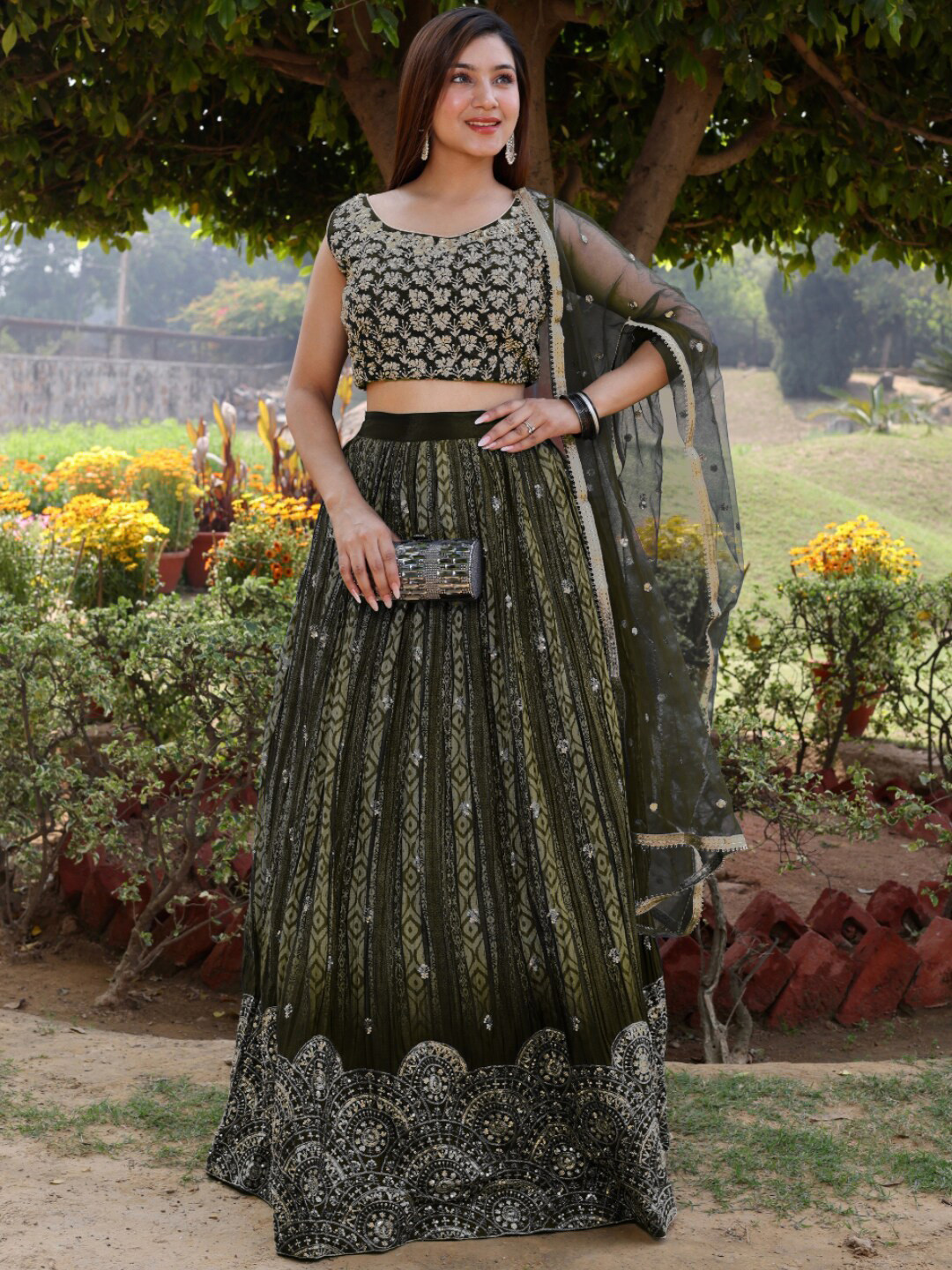

Chhabra 555 Green Embroidered Lehenga With Choli & Dupatta