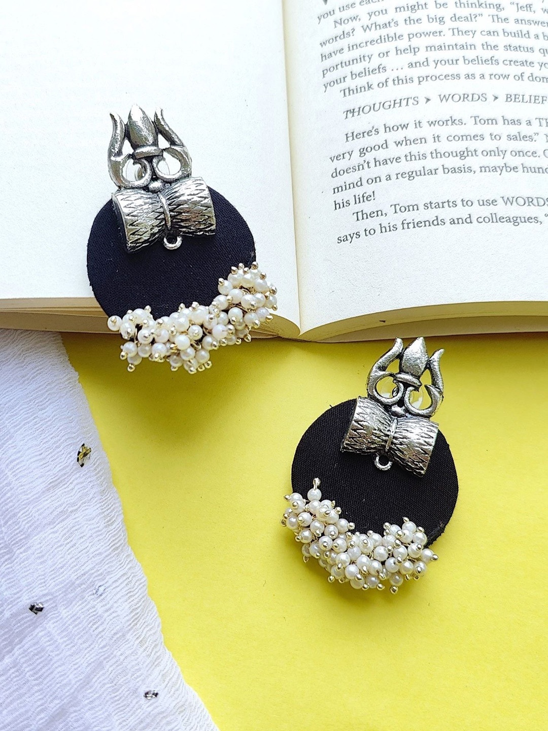 

Crunchy Fashion Silver-Plated Circular Studs Earrings, Black