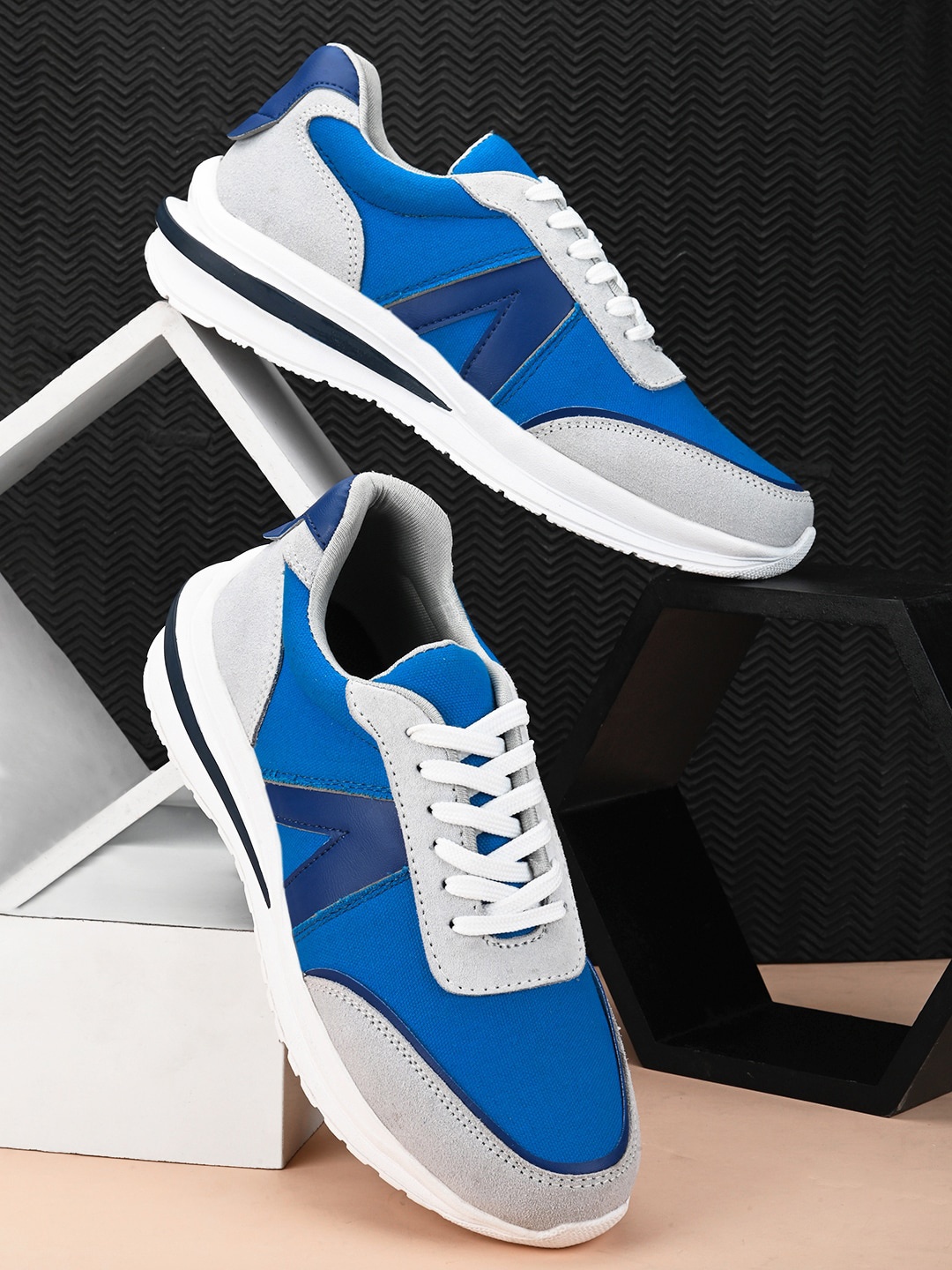 

The Roadster Lifestyle Co. Men Blue & Grey Colourblocked Lace-Up Sneakers