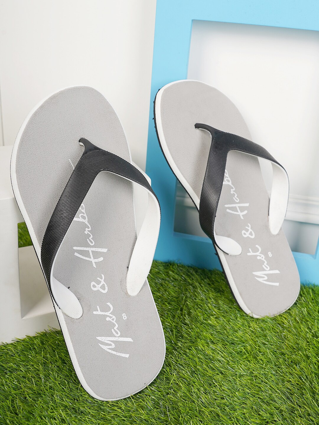 

Mast & Harbour Men Black & White Printed Thong Flip-Flops
