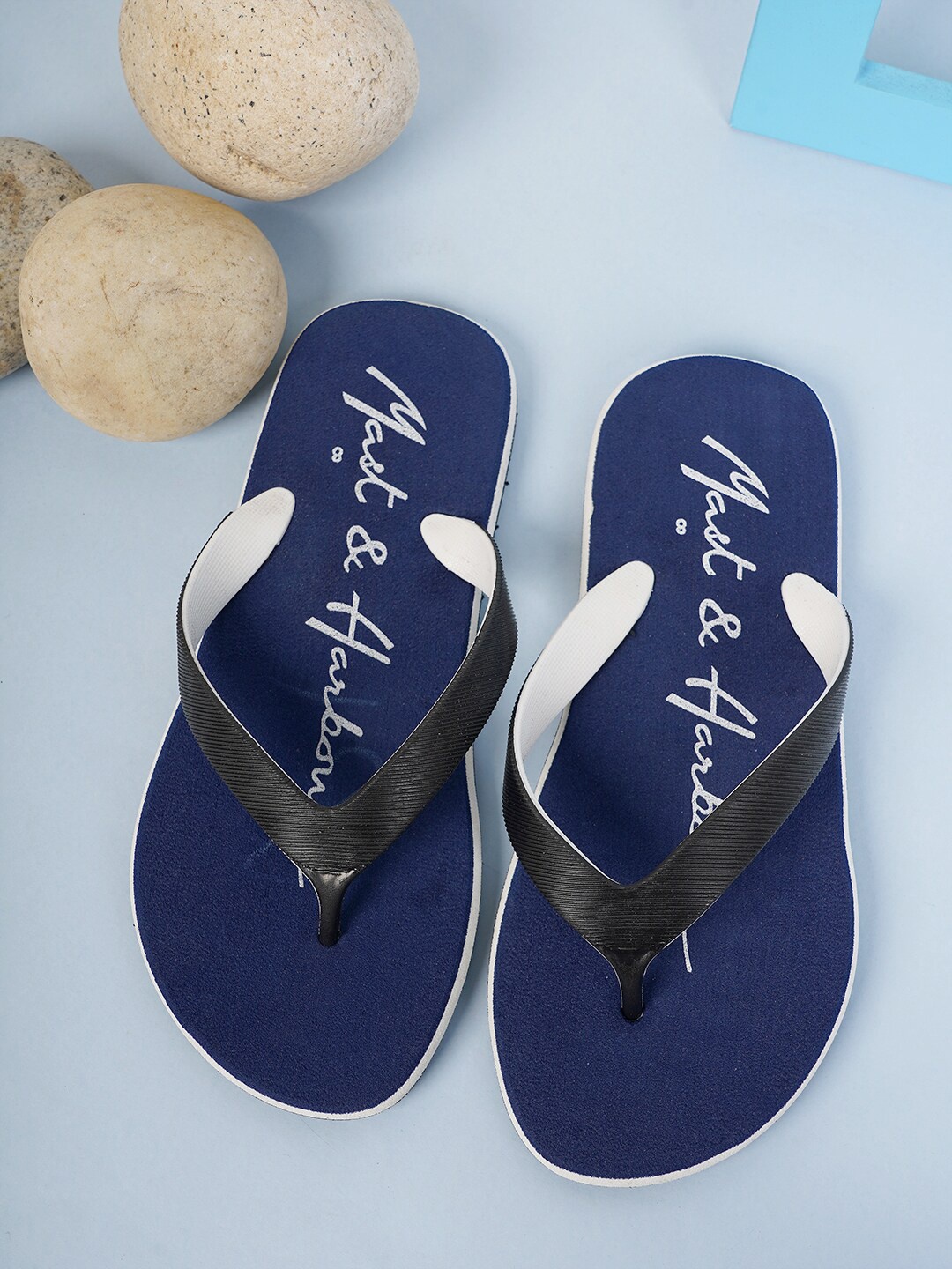 

Mast & Harbour Men Black & Navy Blue Printed Rubber Thong Flip-Flops