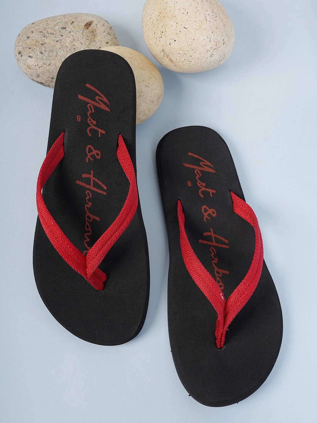 

Mast & Harbour Men Red & Black Printed Thong Flip-Flops