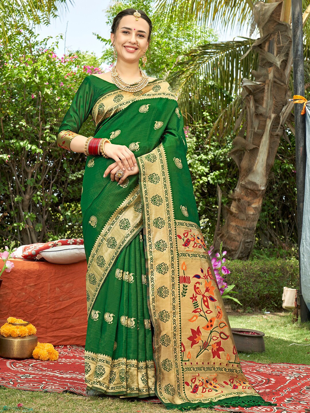 

Anouk Rustic Green & Gold-Toned Ethnic Motifs Woven Design Zari Banarasi Saree