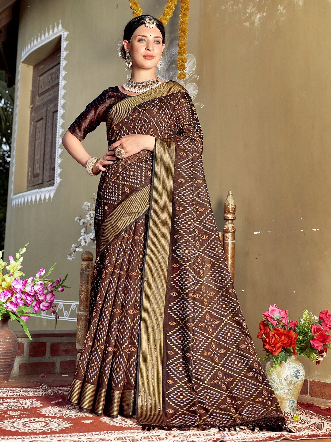 

Anouk Brown & Yellow Ethnic Motifs Printed Chanderi Saree