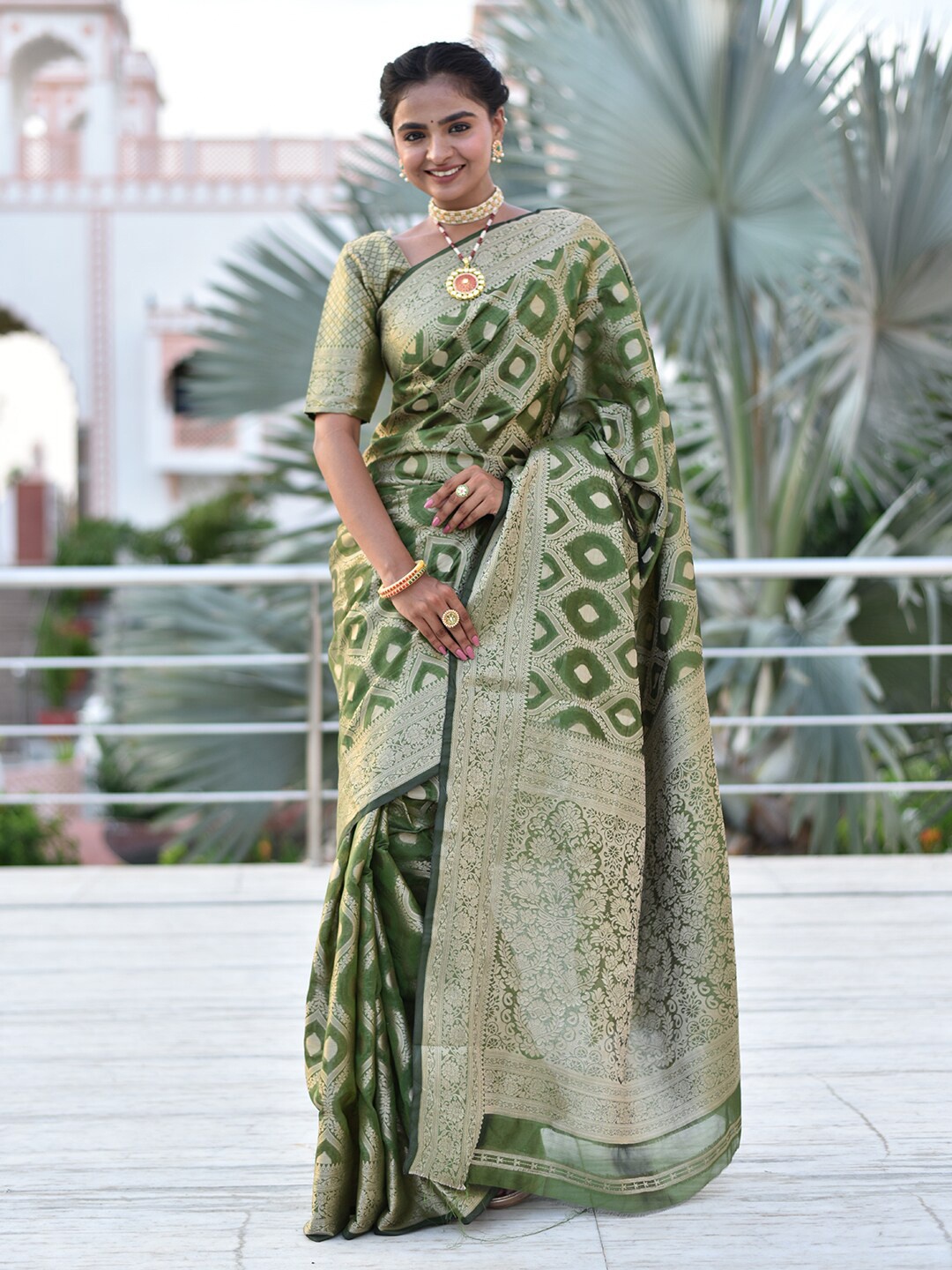 

Anouk Green & Gold-Toned Woven Design Zari Saree