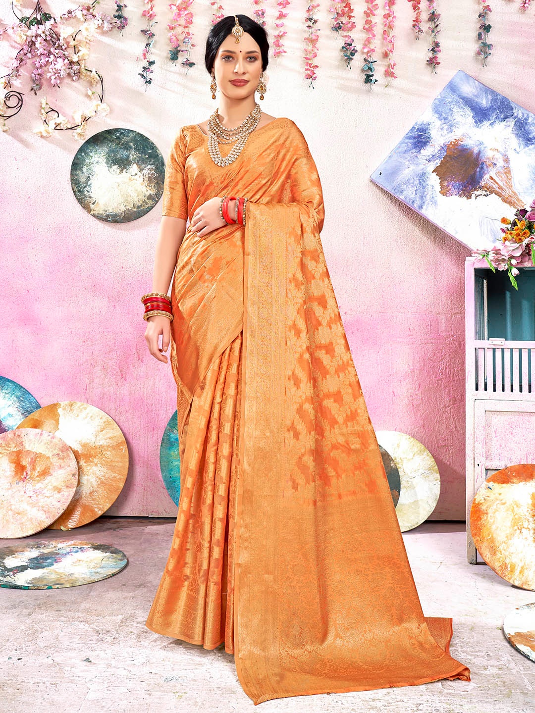 

Anouk Orange Ethnic Motifs Woven Design Zari Art Silk Saree