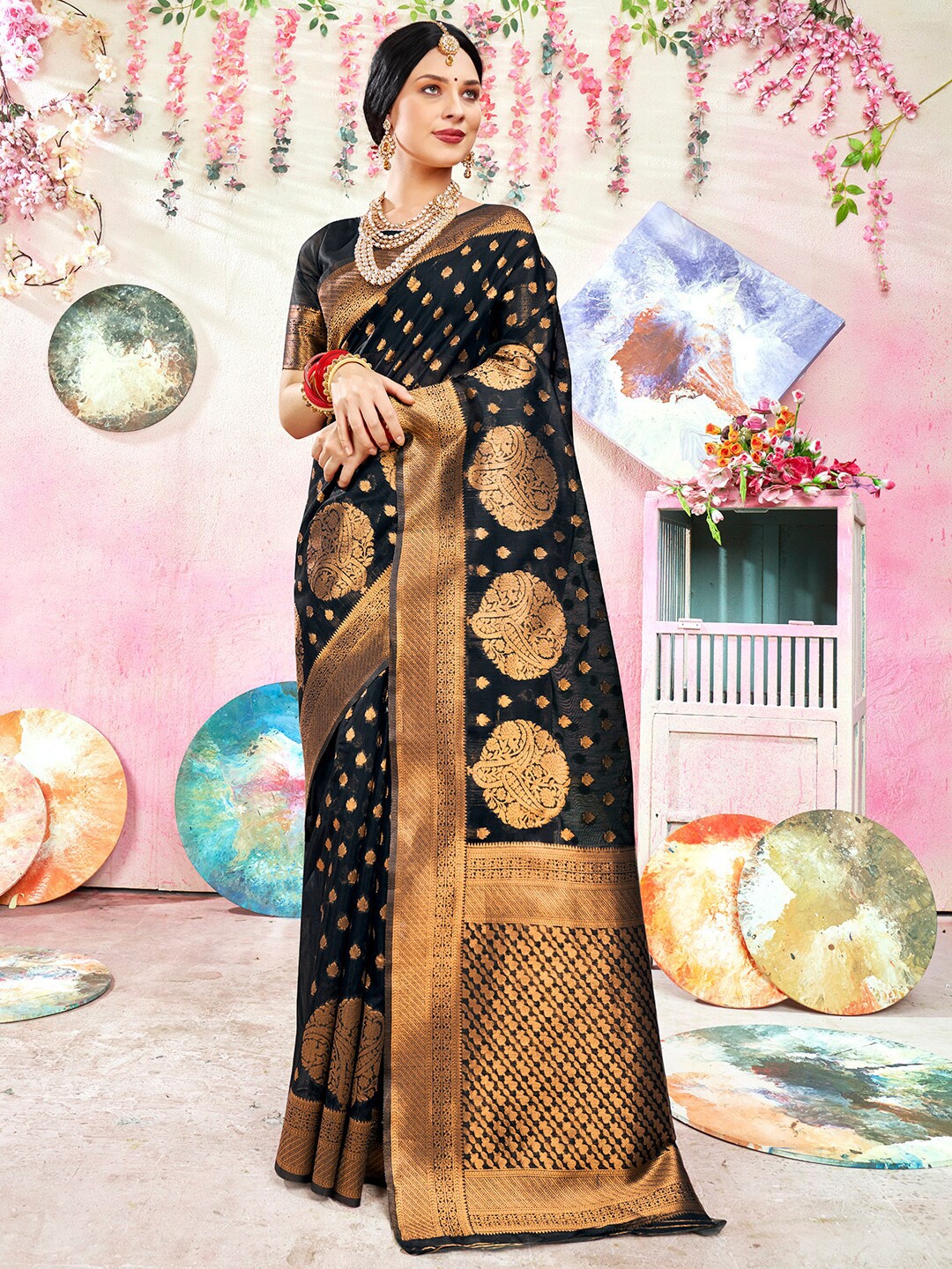 

Anouk Black & Gold-Toned Ethnic Motifs Woven Design Zari Art Silk Saree