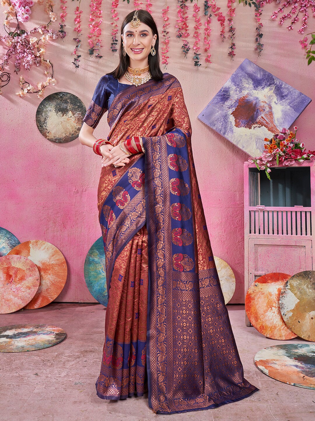 

Anouk Blue & Rust Ethnic Motifs Woven Design Zari Kanjeevaram Saree