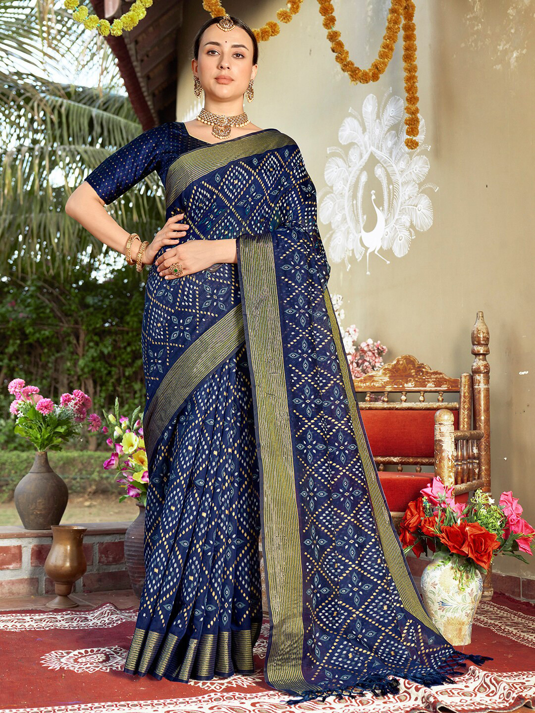 

Anouk Blue & White Ethnic Motifs Printed Zari Chanderi Saree