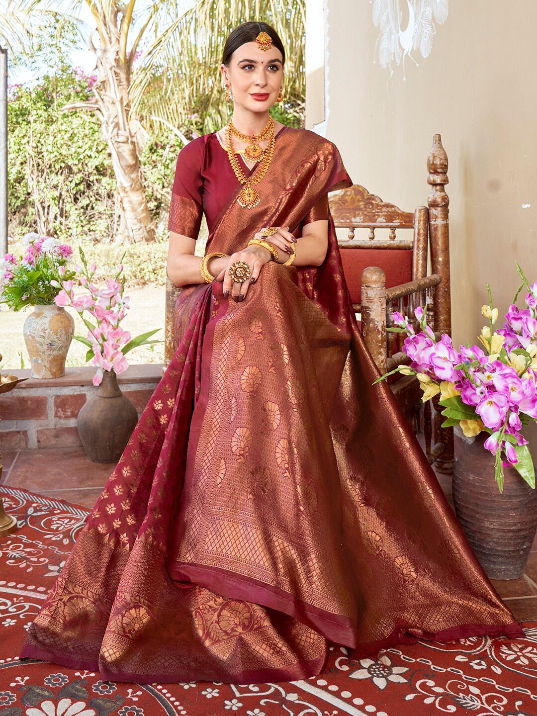 

Anouk Burgundy & Gold-Toned Ethnic Motifs Woven Design Zari Banarasi Saree