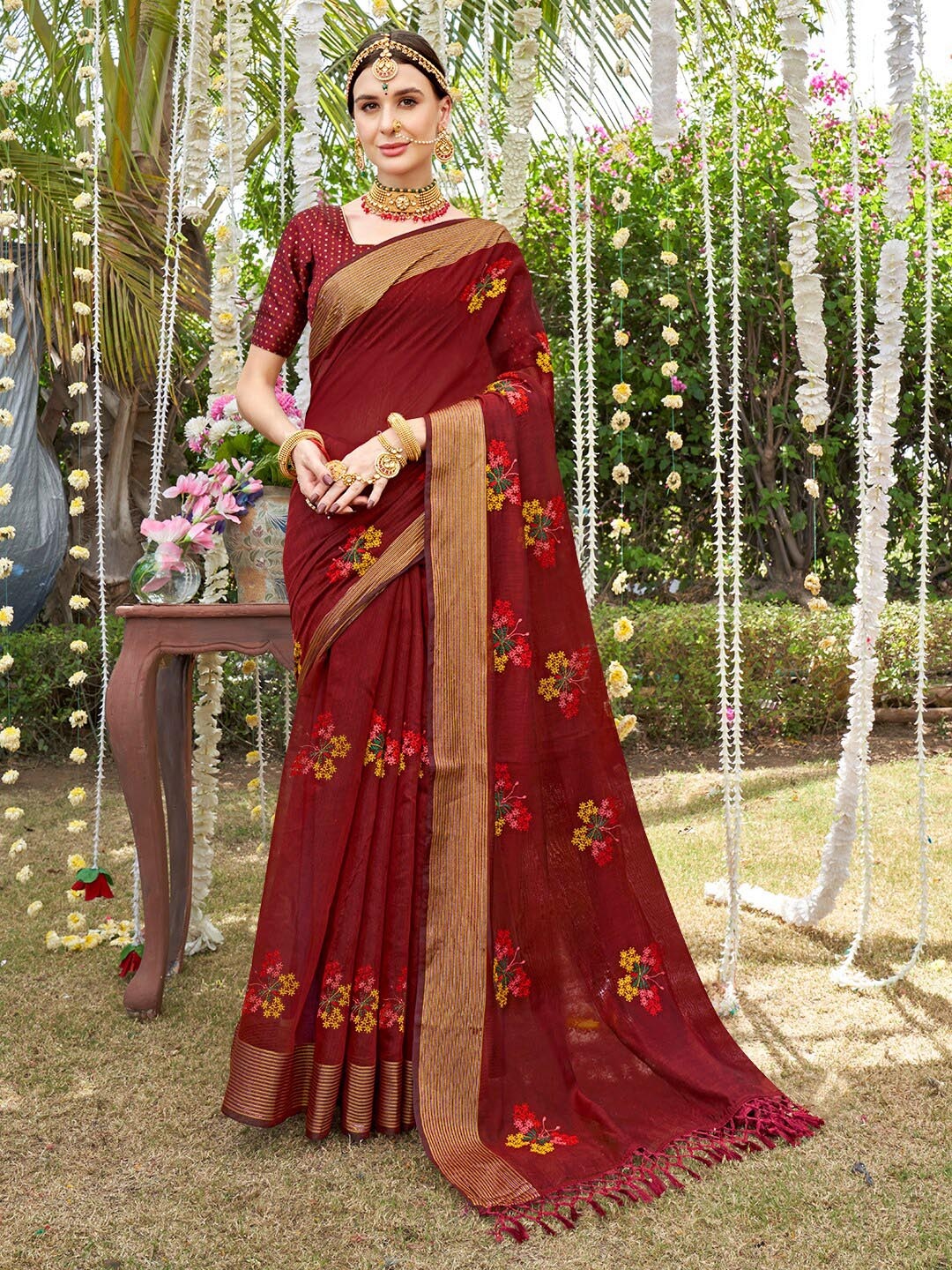 

Anouk Maroon & Red Floral Embroidered Zari Chanderi Saree