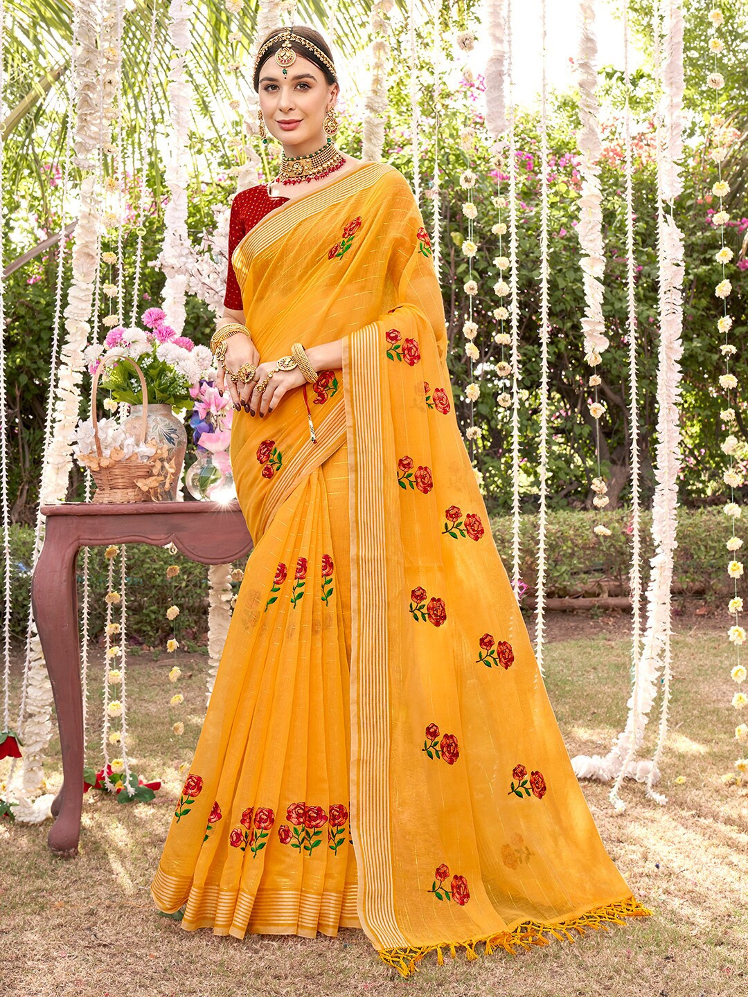 

Anouk Yellow & Red Floral Embroidered Silk Cotton Chanderi Saree