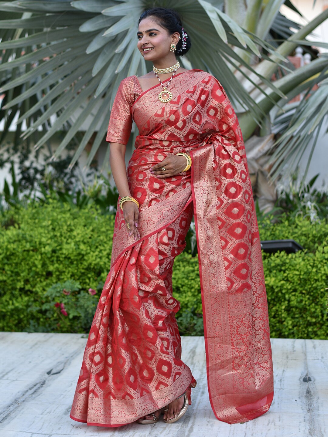 

Anouk Red & Gold-Toned Ethnic Motifs Woven Design Zari Saree