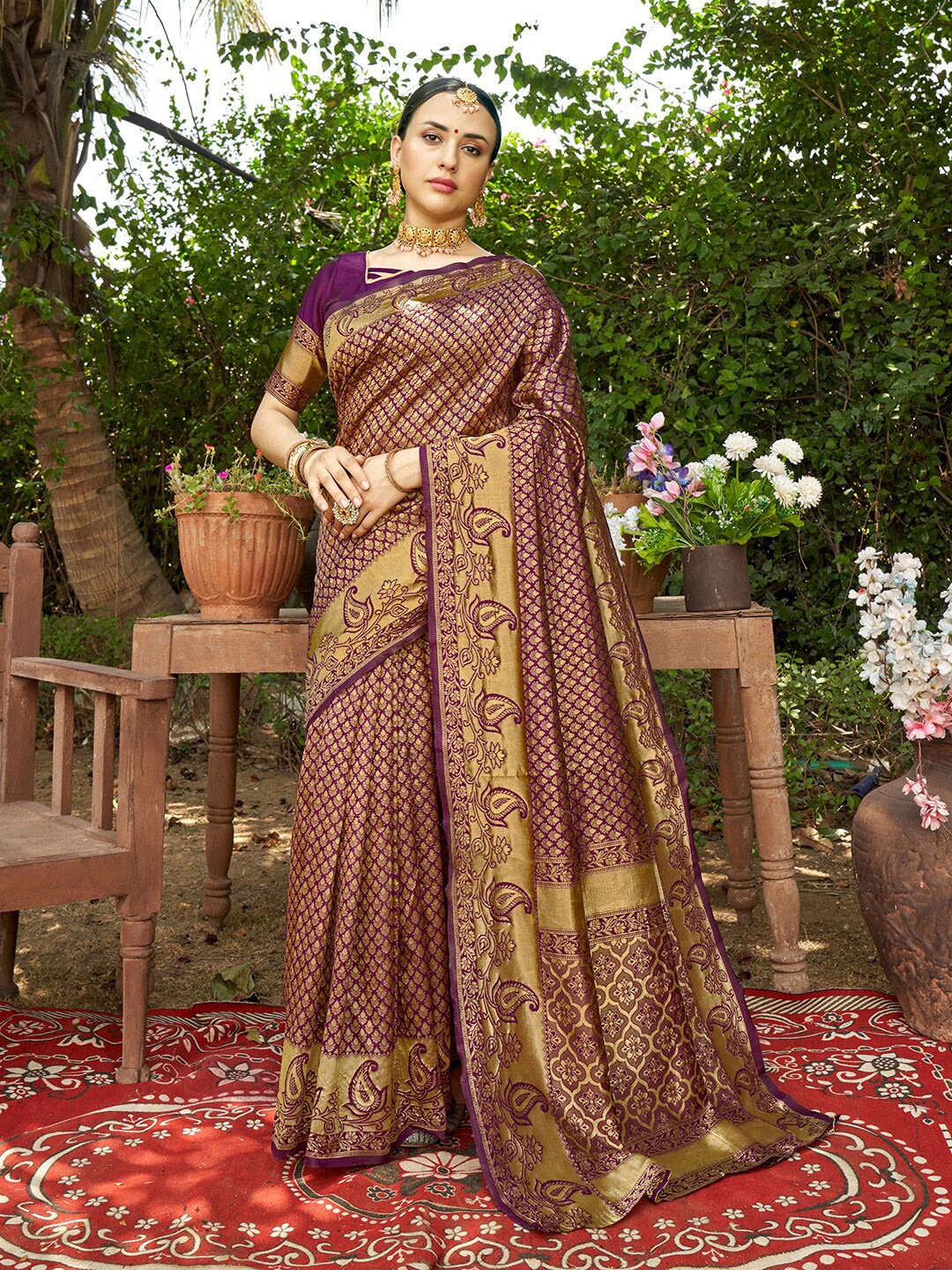 

Anouk Magenta Ethnic Motifs Woven Design Zari Kanjeevaram Saree