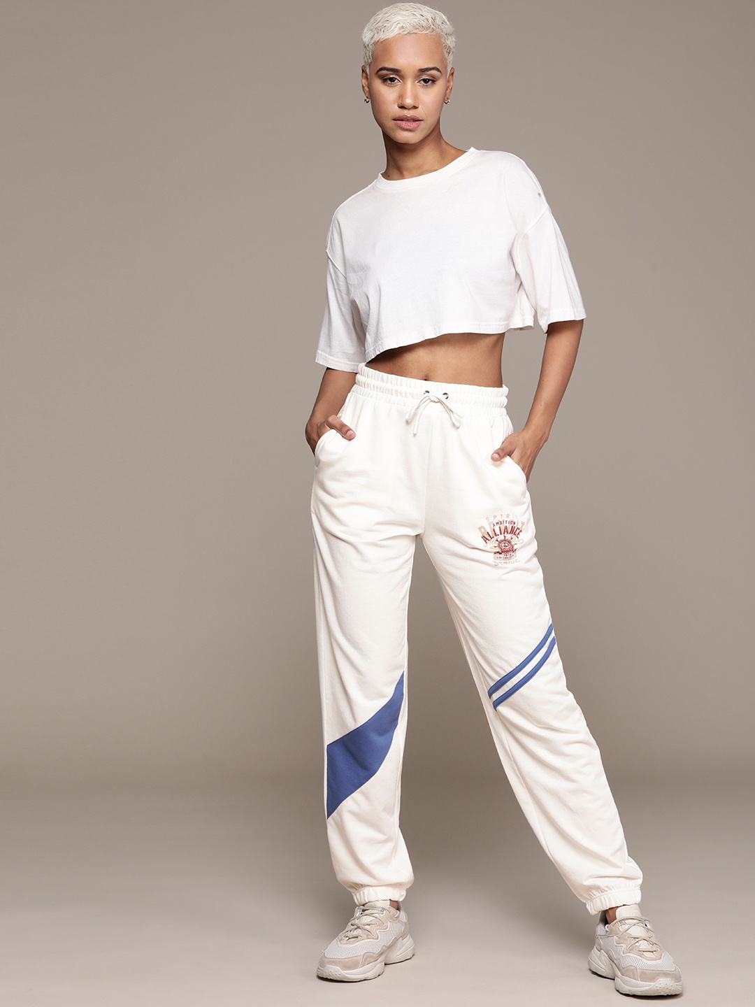 

The Roadster Lifestyle Co. RE/LAX Women Solid Tapered Joggers, Off white