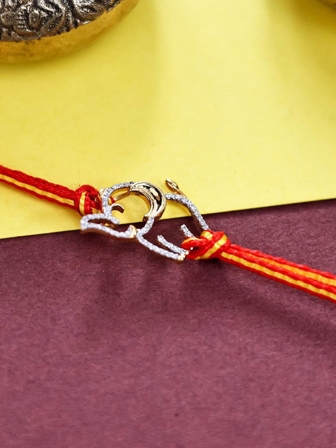 

KUBERBOX 18KT Gold Diamond-Studded Elephant Charm Rakhi-1.84gm