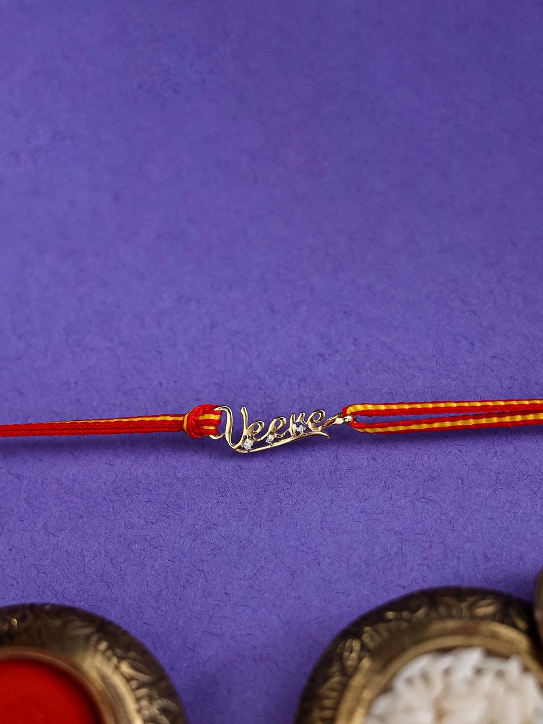 

KUBERBOX 18KT Gold Diamond-Studded Veere Charm Rakhi-0.8gm