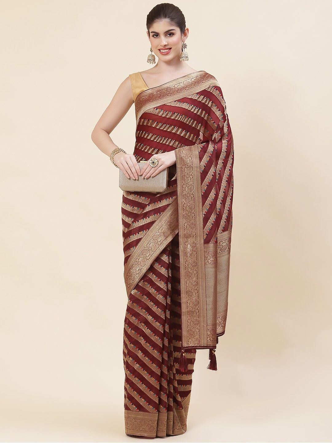 

Meena Bazaar Maroon & Gold-Toned Woven Design Zari Organza Saree