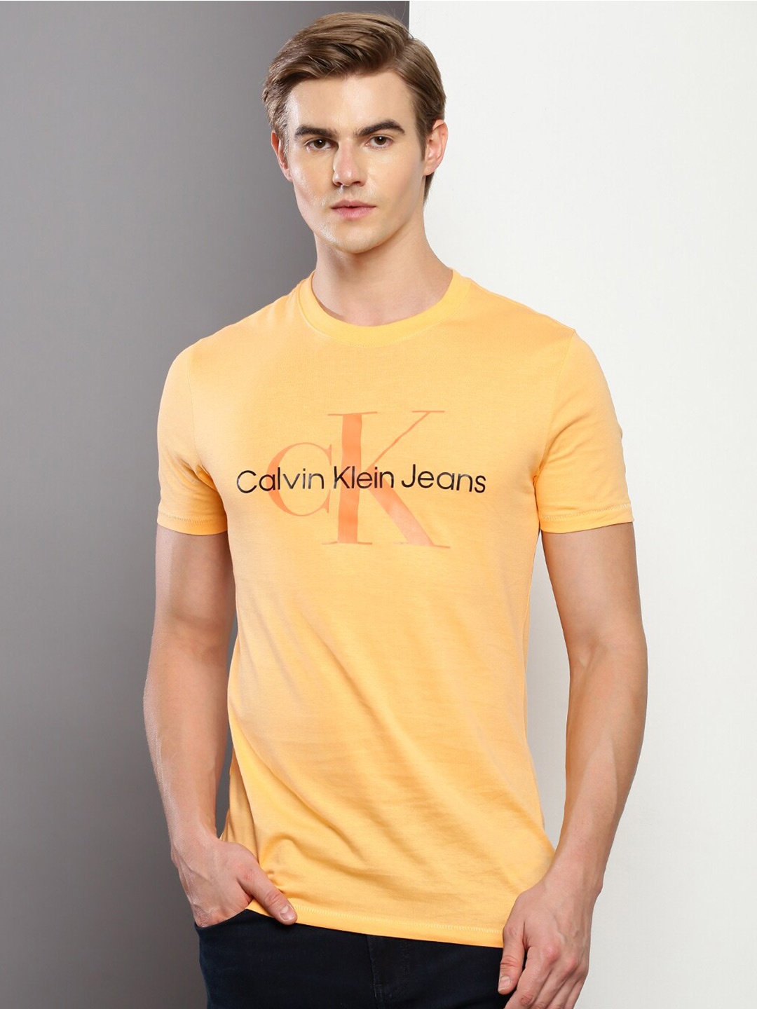 

Calvin Klein Jeans Typography Printed Cotton T-shirt, Yellow
