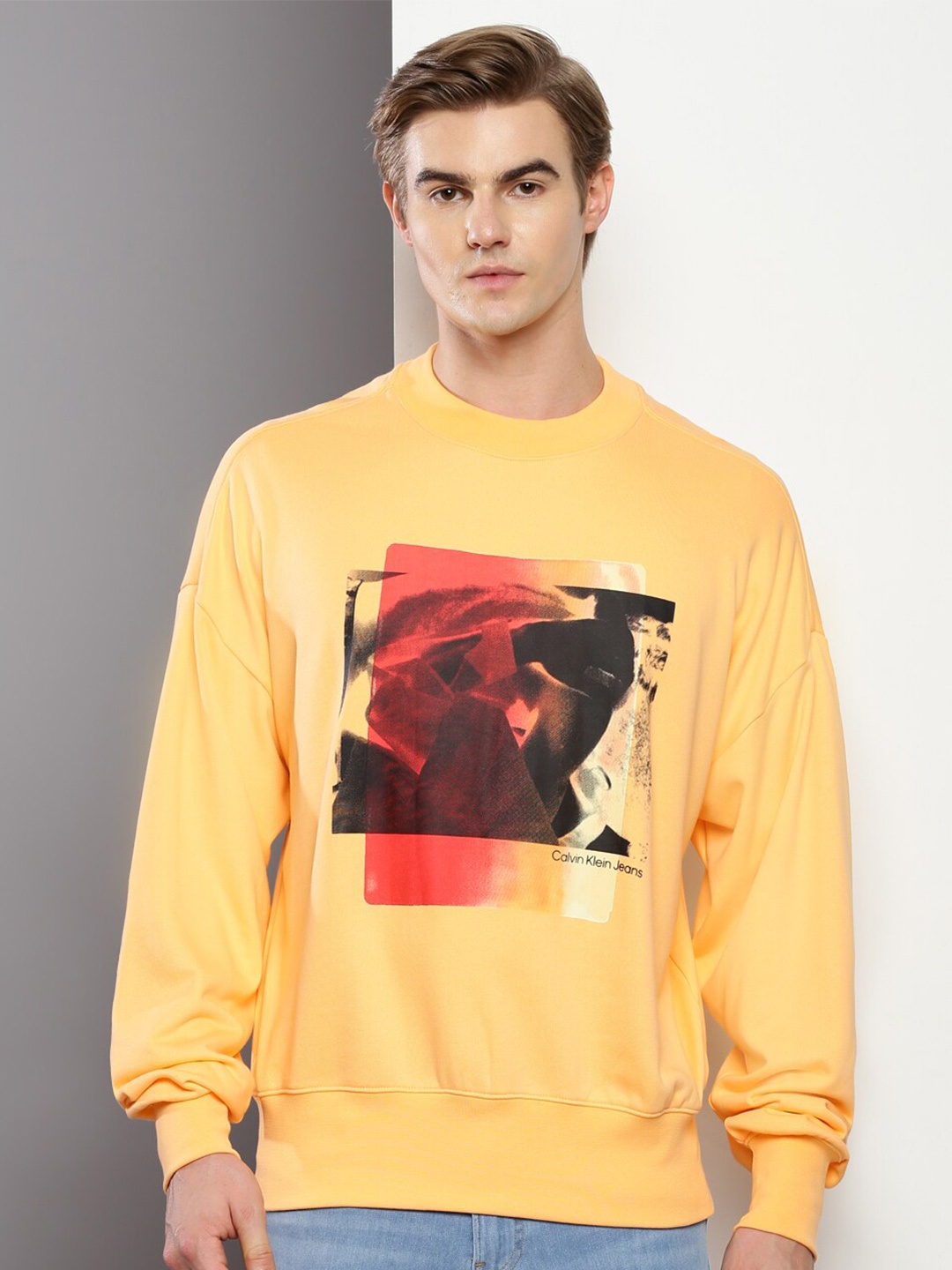 

Calvin Klein Jeans Graphic Printed Pullover Pure Cotton Sweatshirt, Yellow