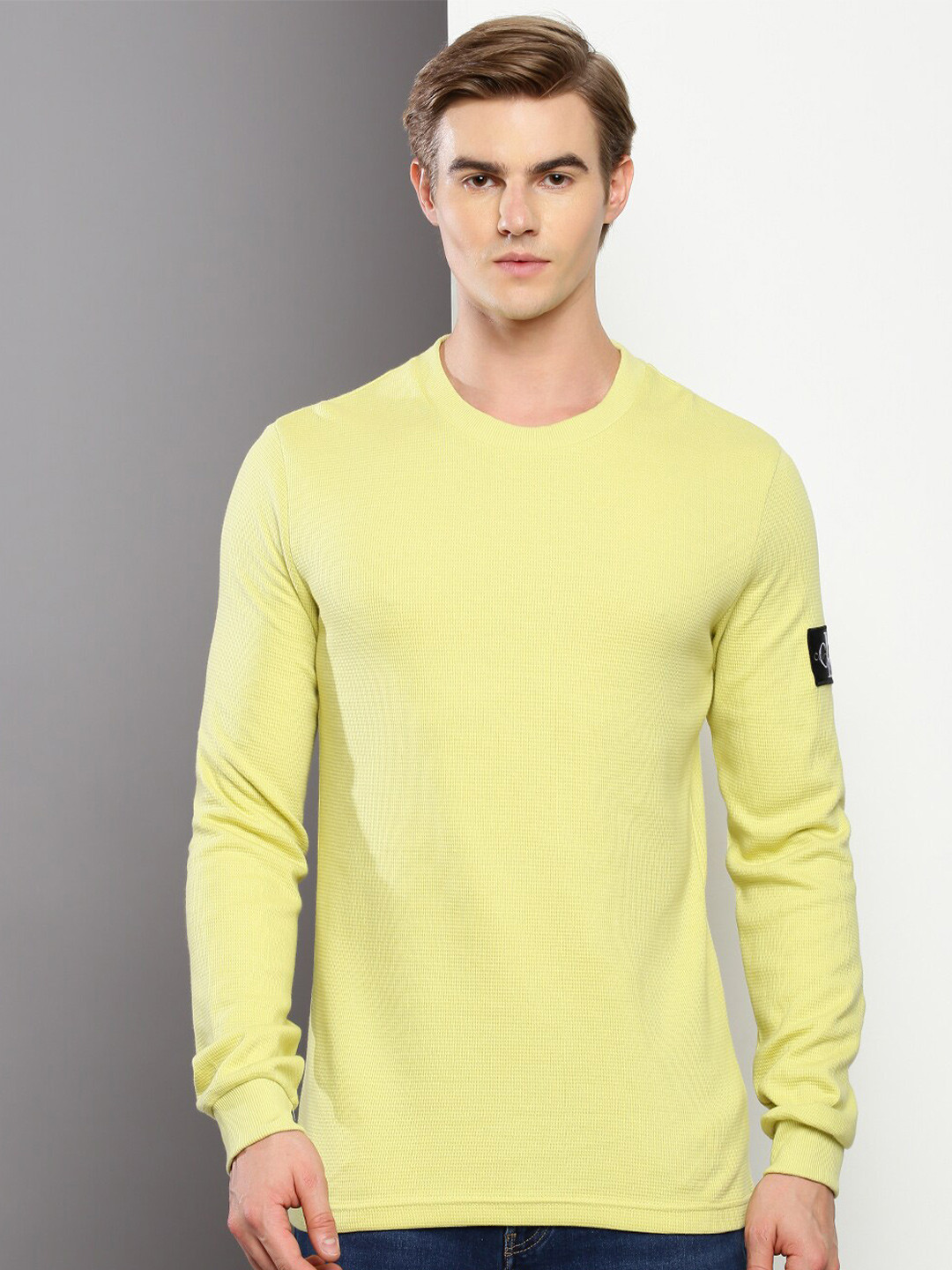 

Calvin Klein Jeans Self Design Round Neck Cotton Slim Fit T-Shirt, Yellow