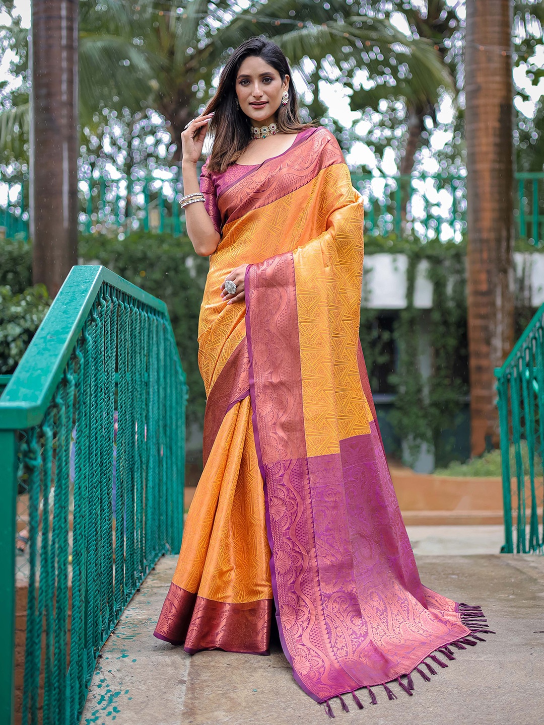 

Mitera Mustard & Purple Woven Design Zari Silk Blend Kanjeevaram Saree