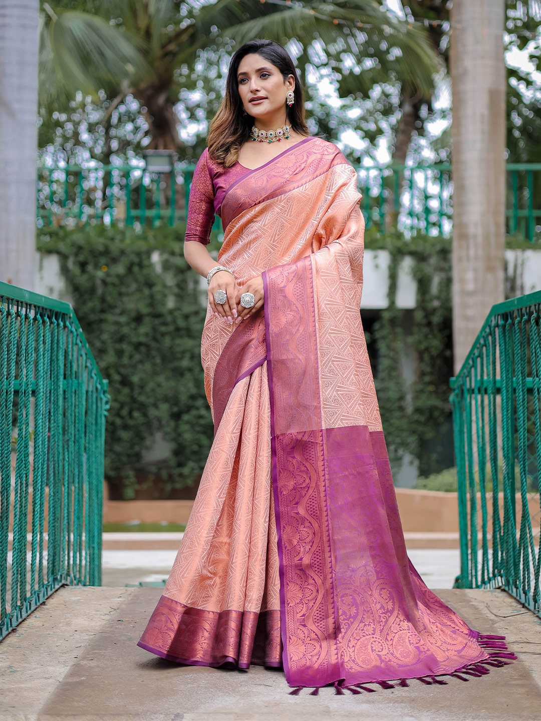 

Mitera Peach-Coloured & Purple Woven Design Zari Silk Blend Kanjeevaram Saree