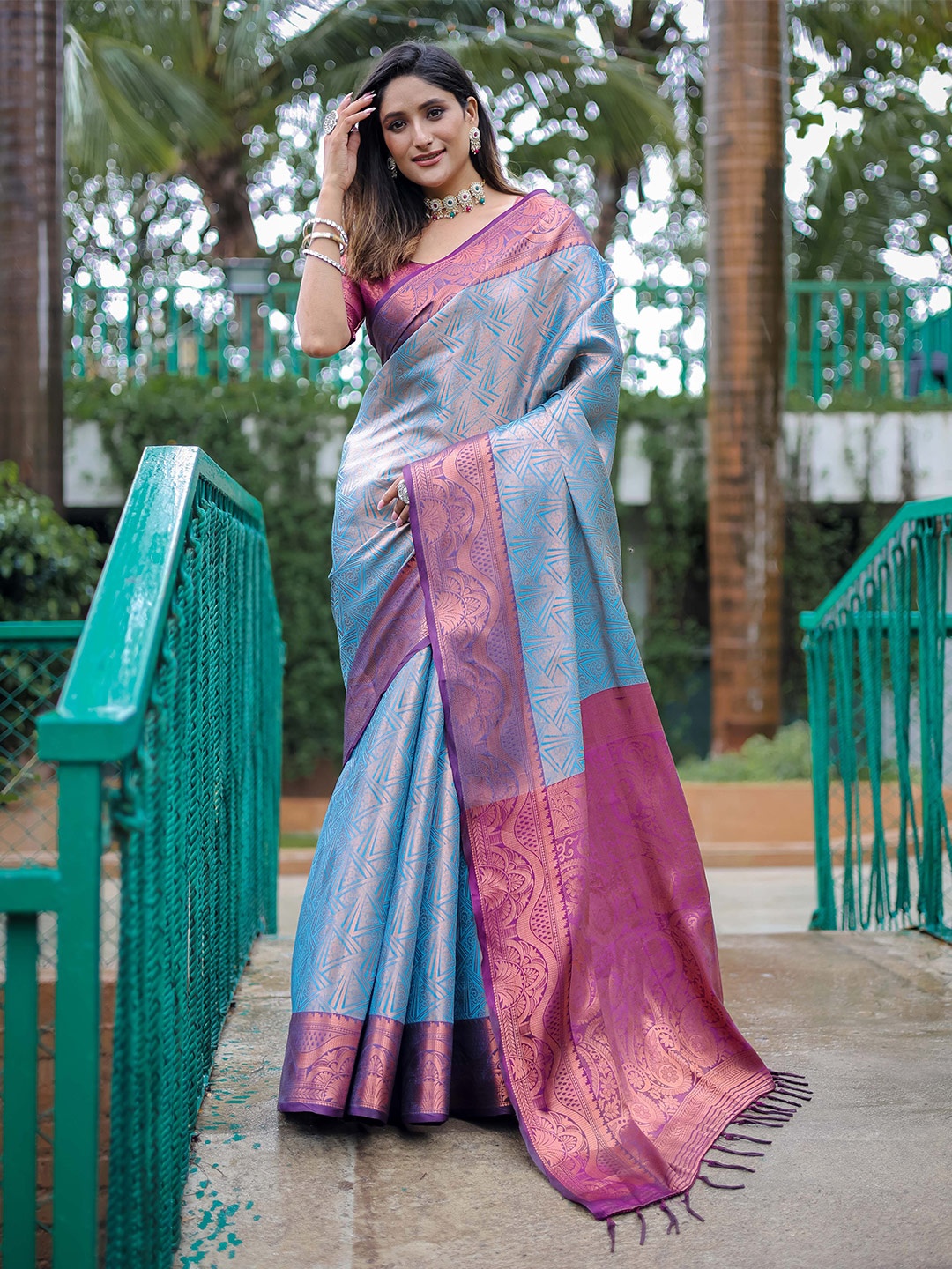 

Mitera Blue & Purple Woven Design Zari Silk Blend Kanjeevaram Saree