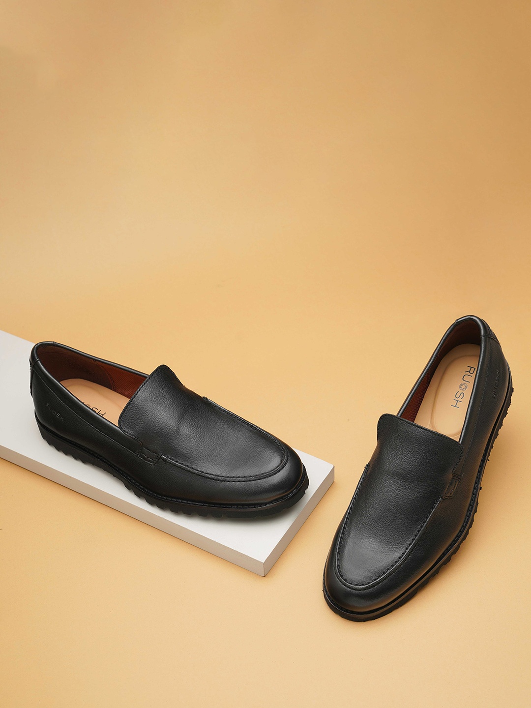 

Ruosh Men Textured Leather Loafers, Black