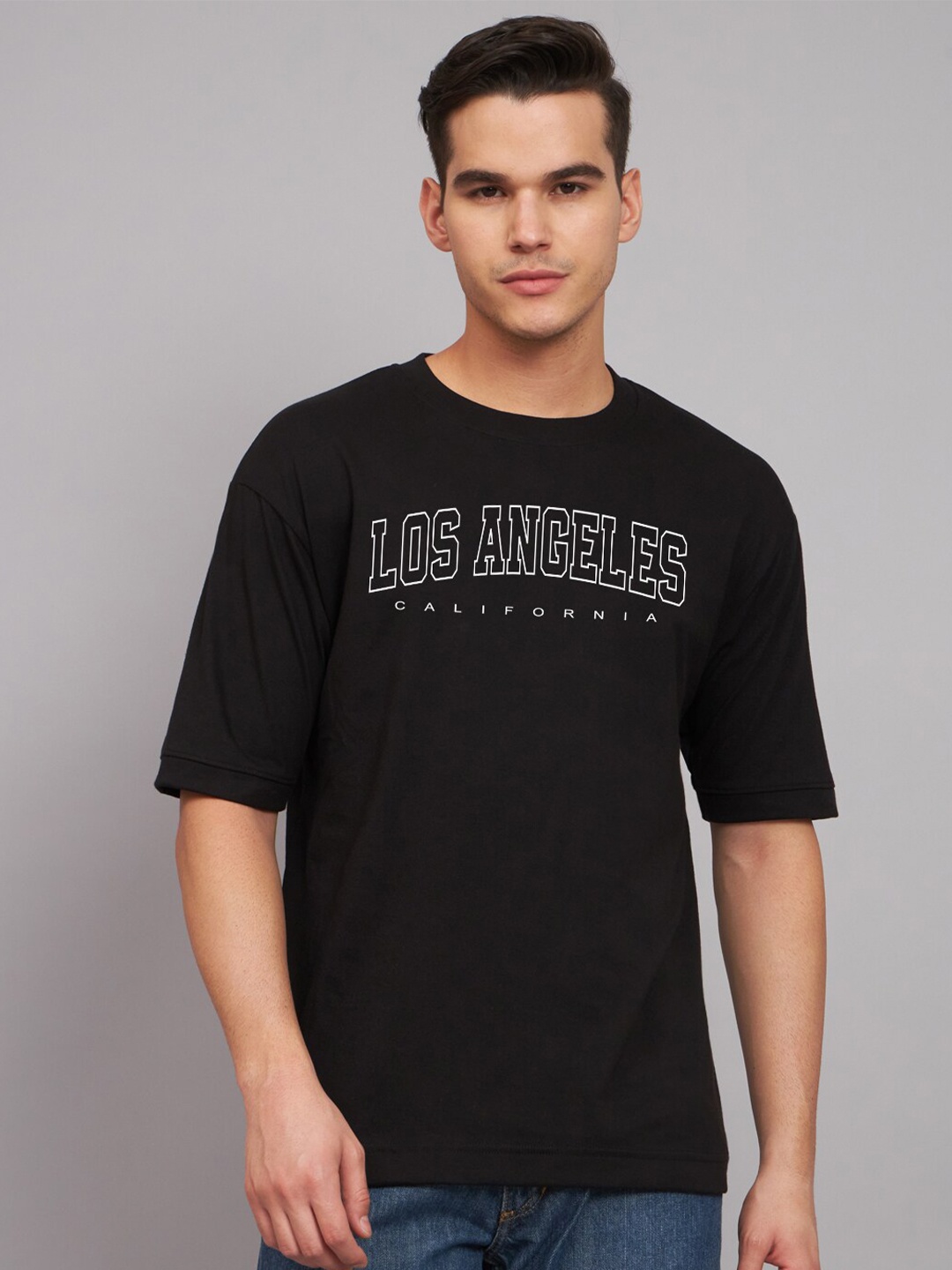

Imsa Moda Typography Printed Drop-Shoulder Sleeves Cotton Oversized T-Shirt, Black
