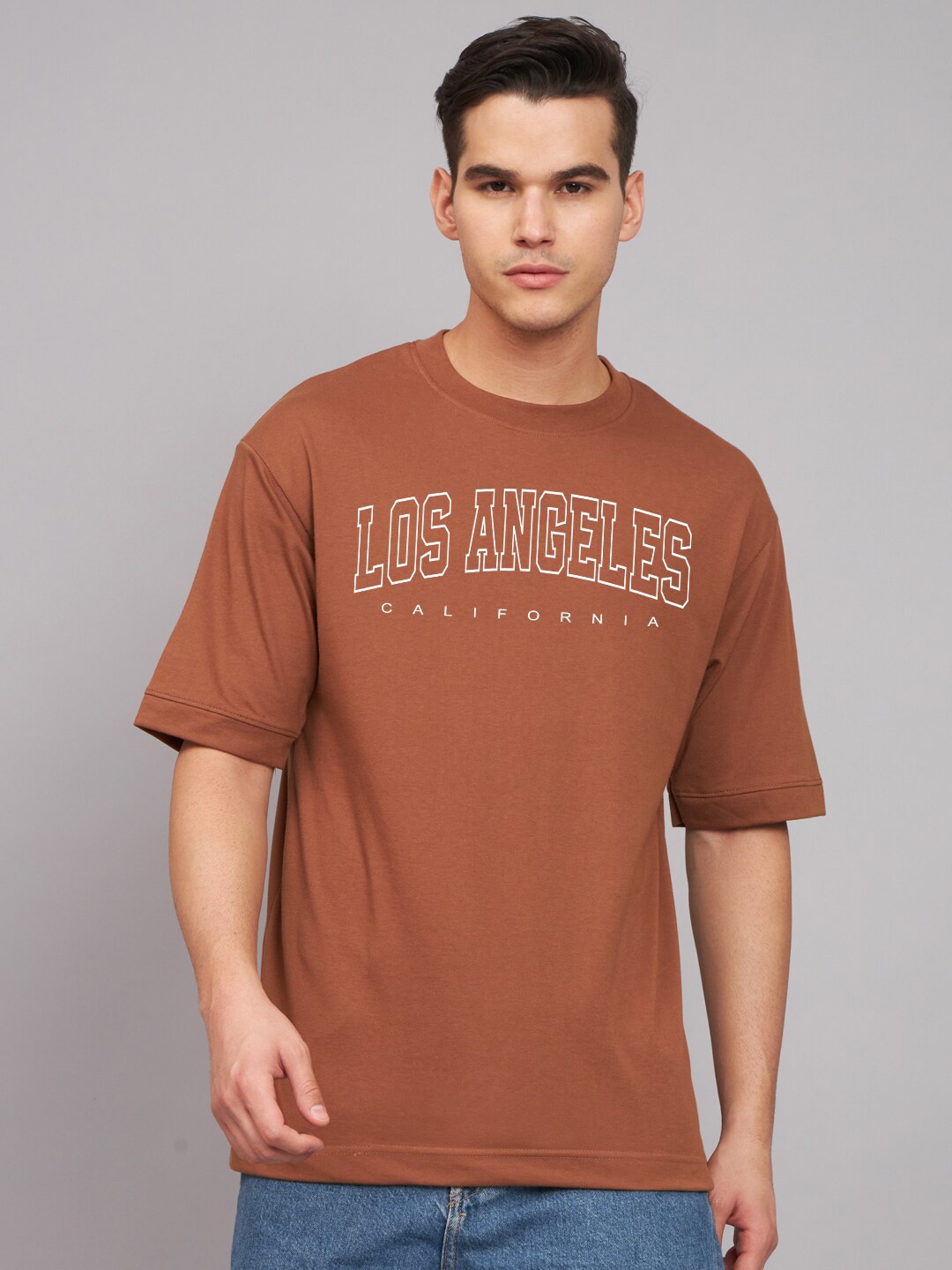 

Imsa Moda Typography Printed Drop-Shoulder Sleeves Cotton Oversized T-Shirt, Coffee brown